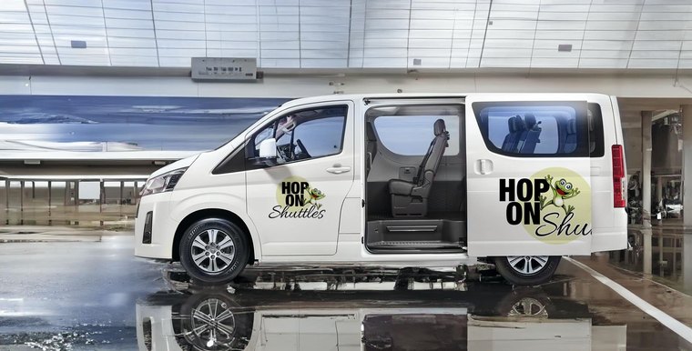 The branded Hop On Shuttles 13-seater